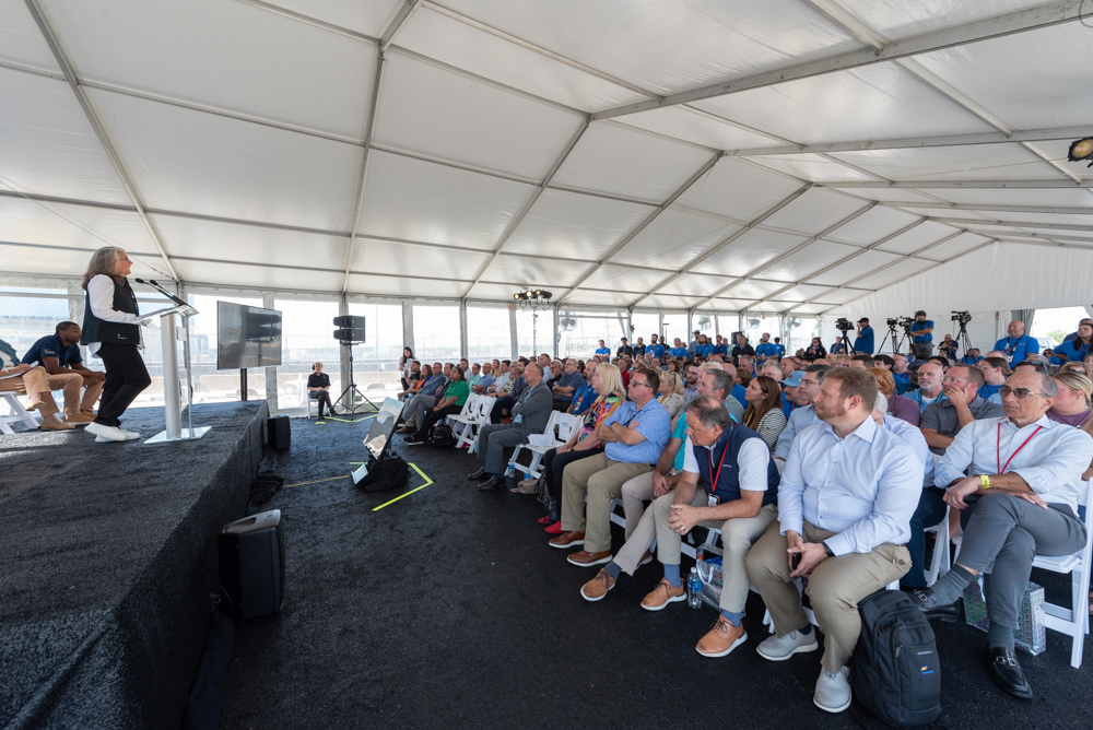 Kathleen Barrón speaking to crowd at Clinton Site Celebration