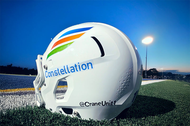 Constellation branded helmet on football field