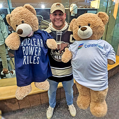 Dave Marcheski holding Hershey Bears wearing Constellation t-shirts