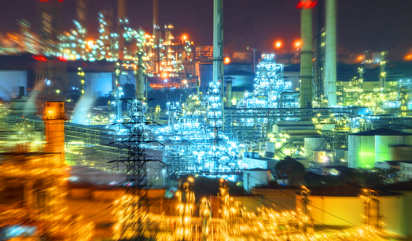 Oil and gas refinery plant area at night